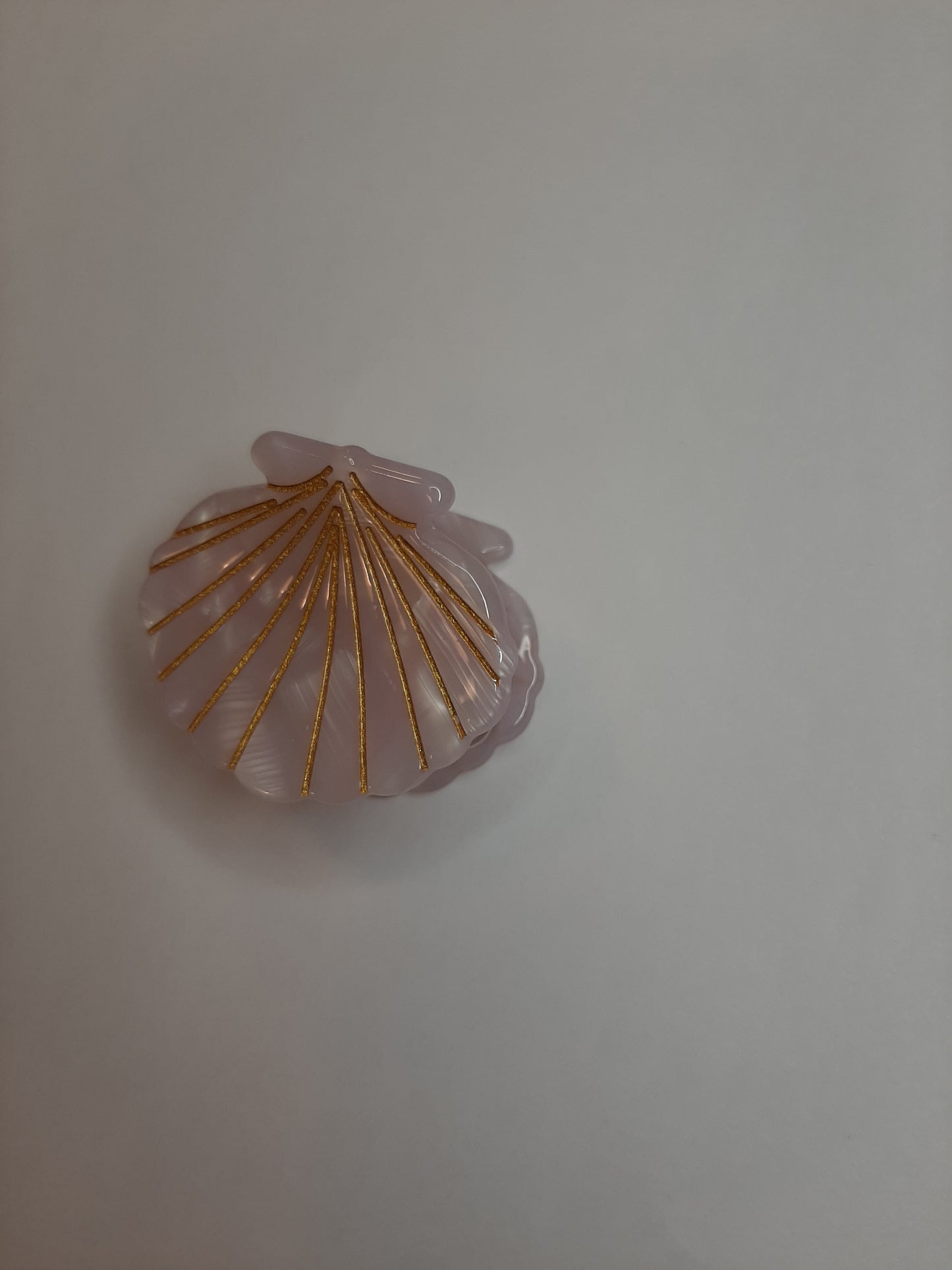 Schelp clip roze/beige tint